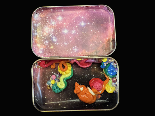 sleeping kitty in space